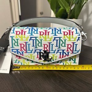 RALPH LAUREN
Tayler Logo Embroidered Leather Mini